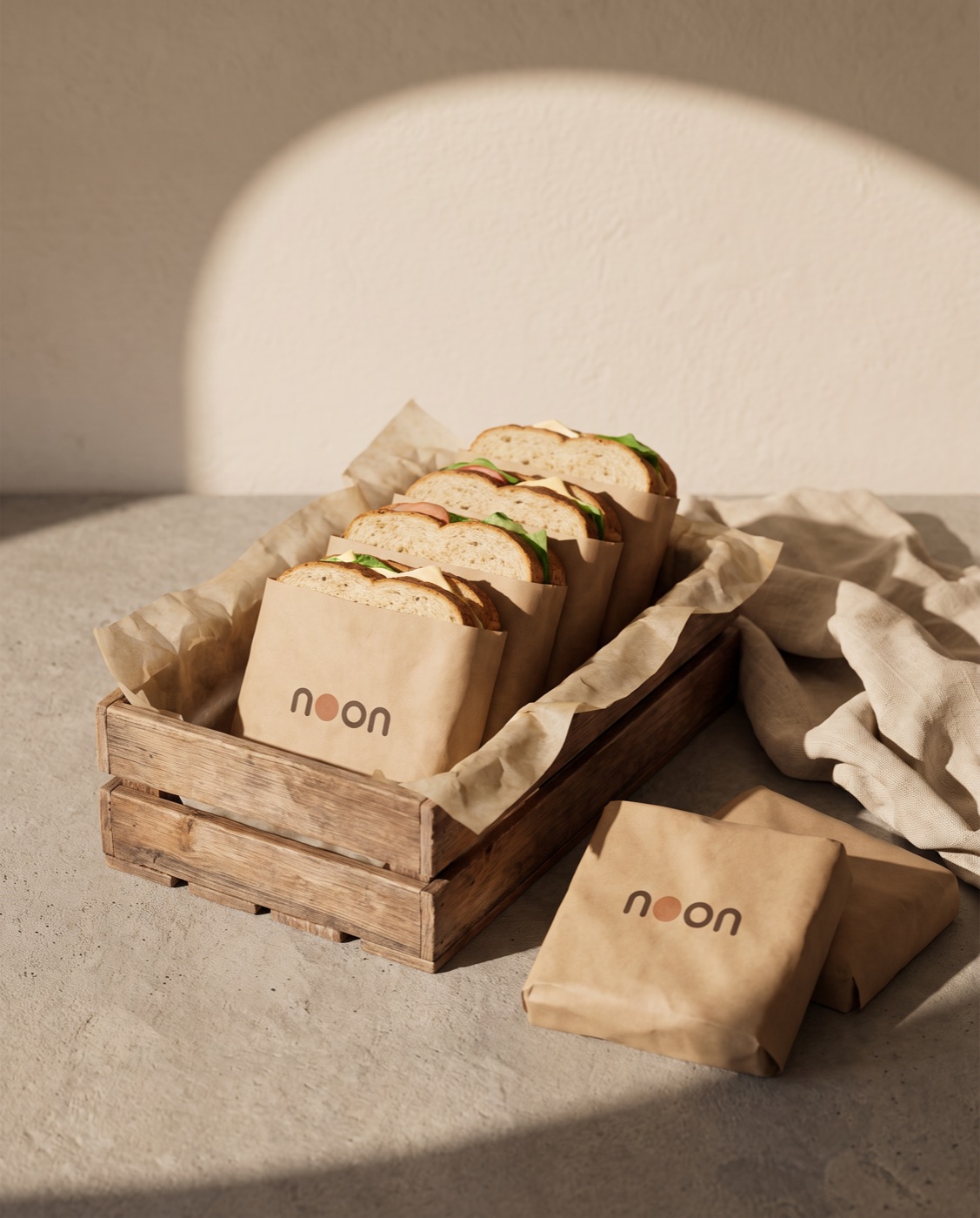 a wooden crate of kraft-wrapped noon sandwiches ready for pickup at the bakery